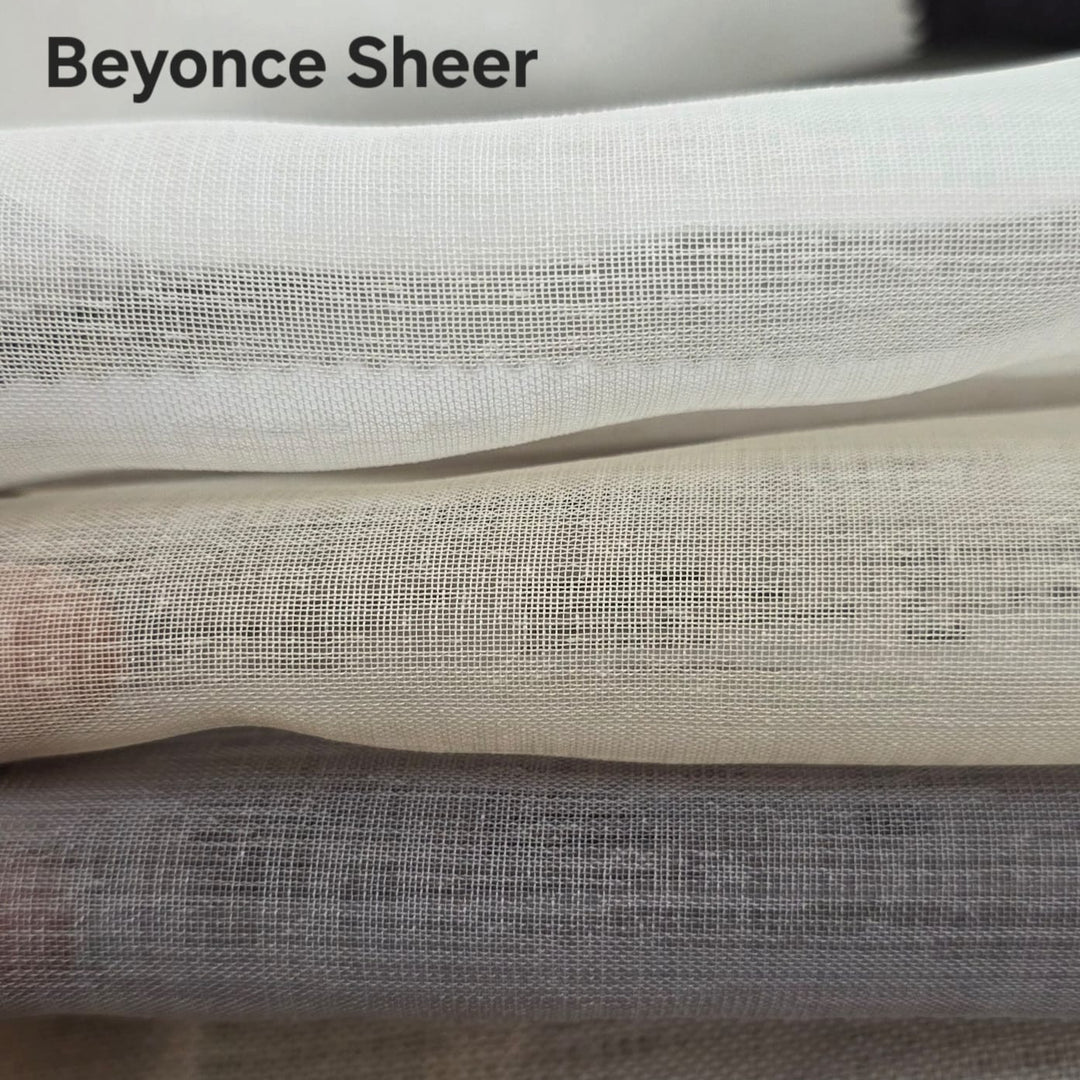 Three stacked layers of sheer fabric in white, cream, and light gray, with the text 'Beyonce Sheer' printed in black at the top left.