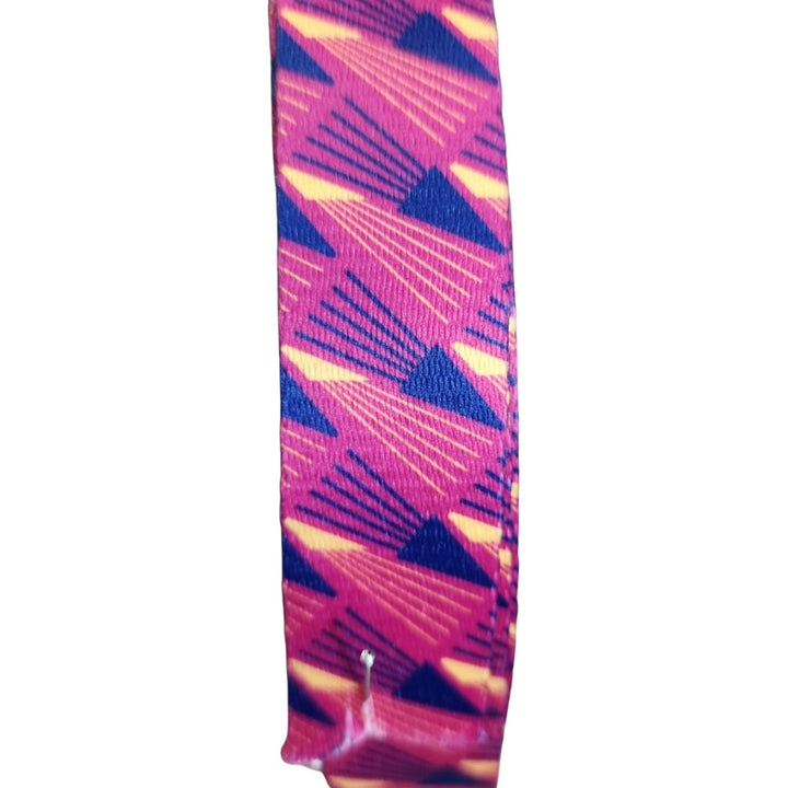 Necklace with pink and purple geometric pattern on a white background