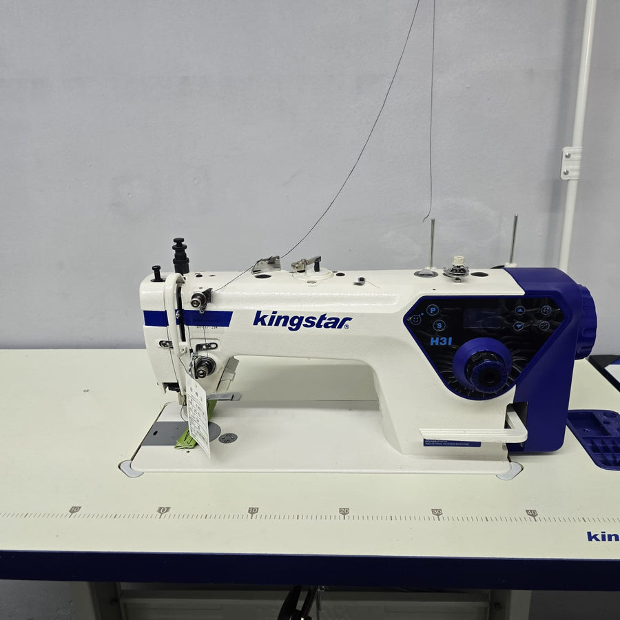 Kingstar sewing machine on a white table with a gray background